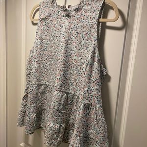 Armless mock neck floral top